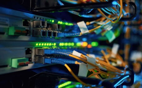 Blue and yellow wires. Close up view of hardware in the server room